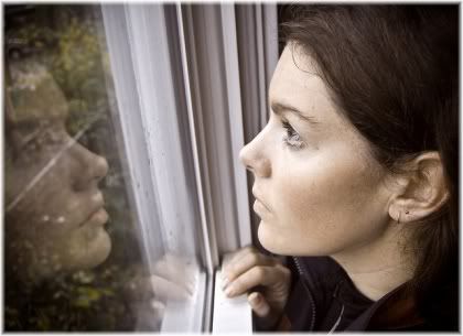 woman reflection in glass