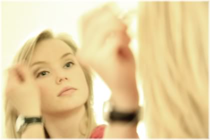 woman applying make up