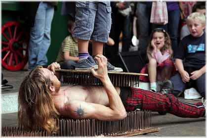 man on bed of nails