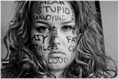 unhappy girl with insults written on face