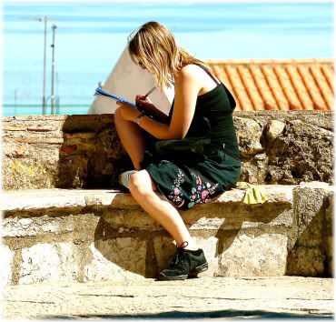 woman writing outside