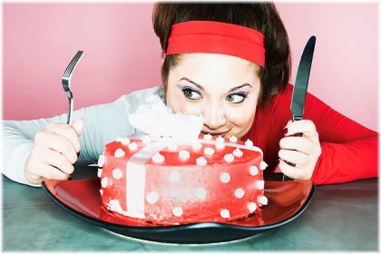woman getting ready to eat cake