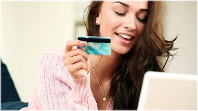 woman with credit card and laptop