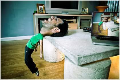 man with big head resting backwards on table