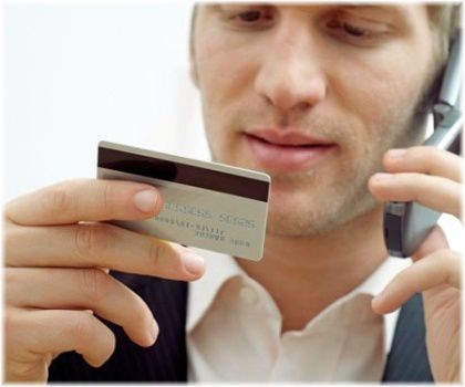 man holding credit card