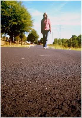 woman walking down road