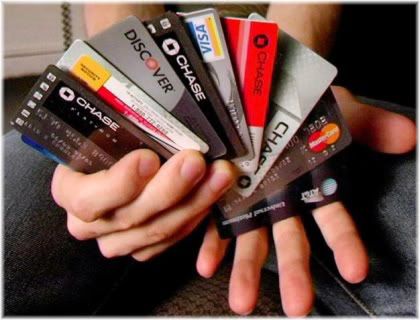 hand full of credit cards