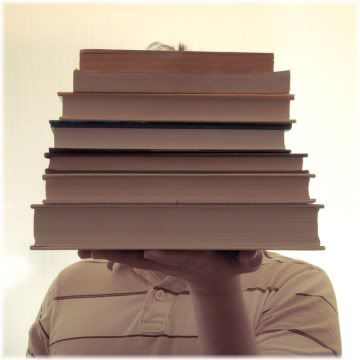 person holding books