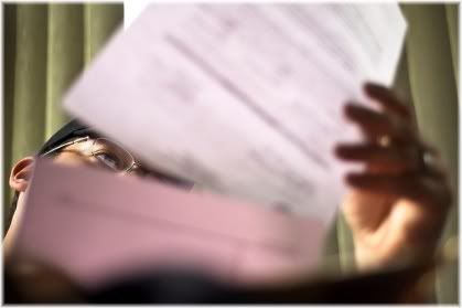 man looking through papers