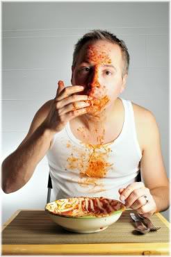 man eating spaghetti messy